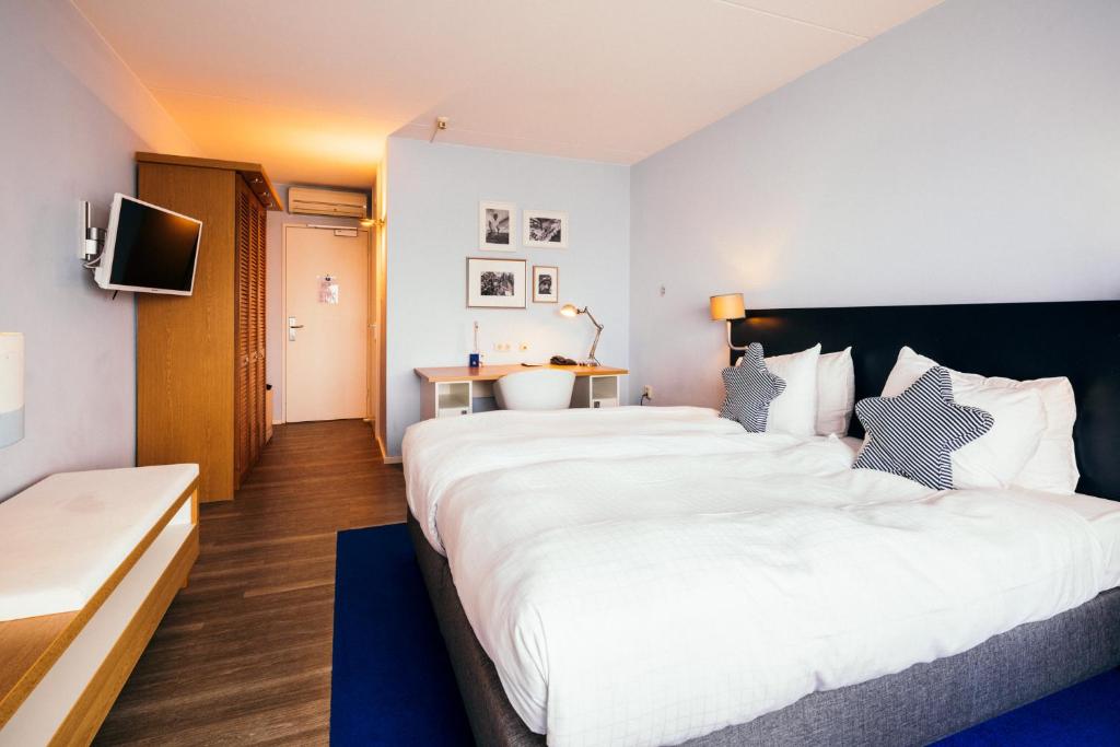 Двухместный (Просторный двухместный номер с 2 отдельными кроватями) отеля Delta Hotel, Роттердам