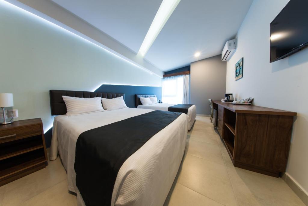 Двухместный (Двухместный номер с 2 отдельными кроватями) отеля Hotel & Suites Clipperton, Веракрус
