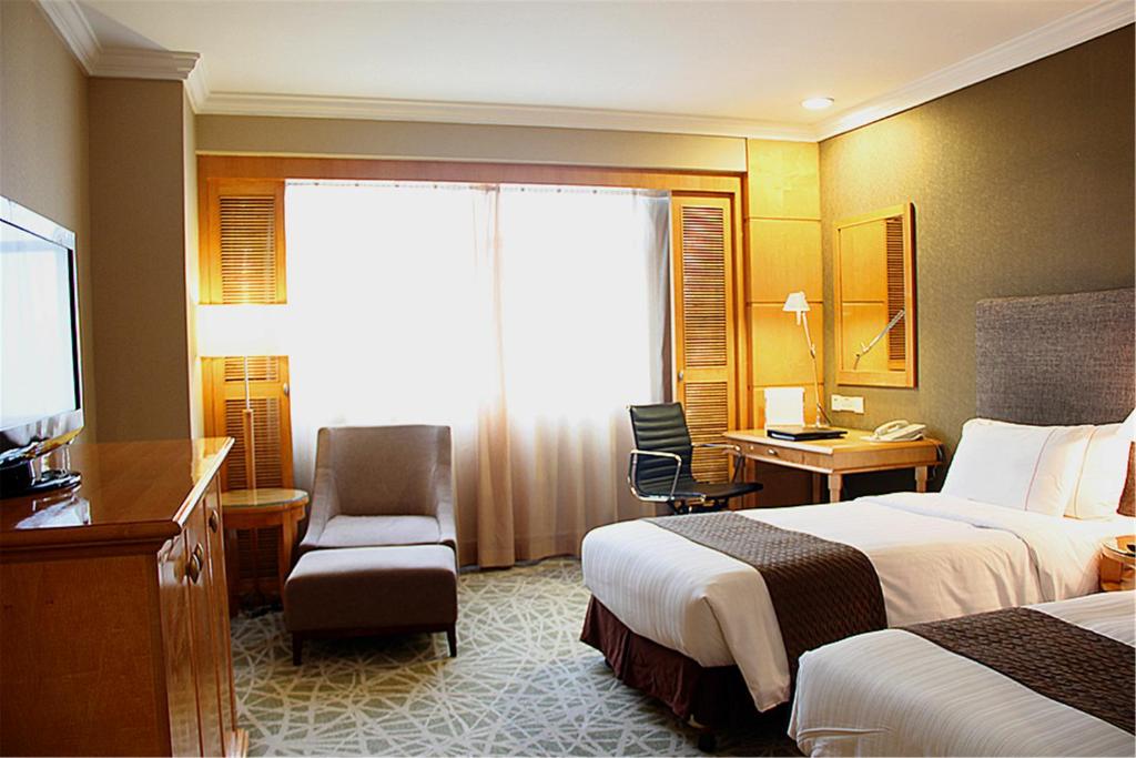 Двухместный (Специальное предложение – Двухместный номер Делюкс с 1 кроватью или 2 отдельными кроватями) отеля Grand Park Wuxi, Уси