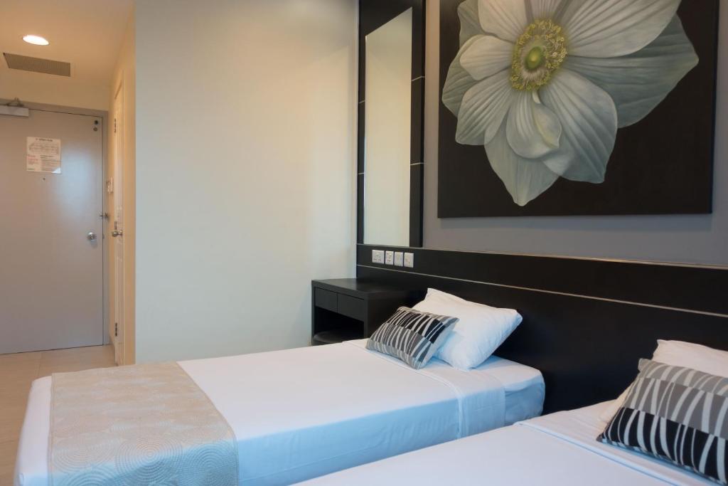 Двухместный (Улучшенный двухместный номер с 2 отдельными кроватями) отеля Hotel 81 Changi, Сингапур (город)