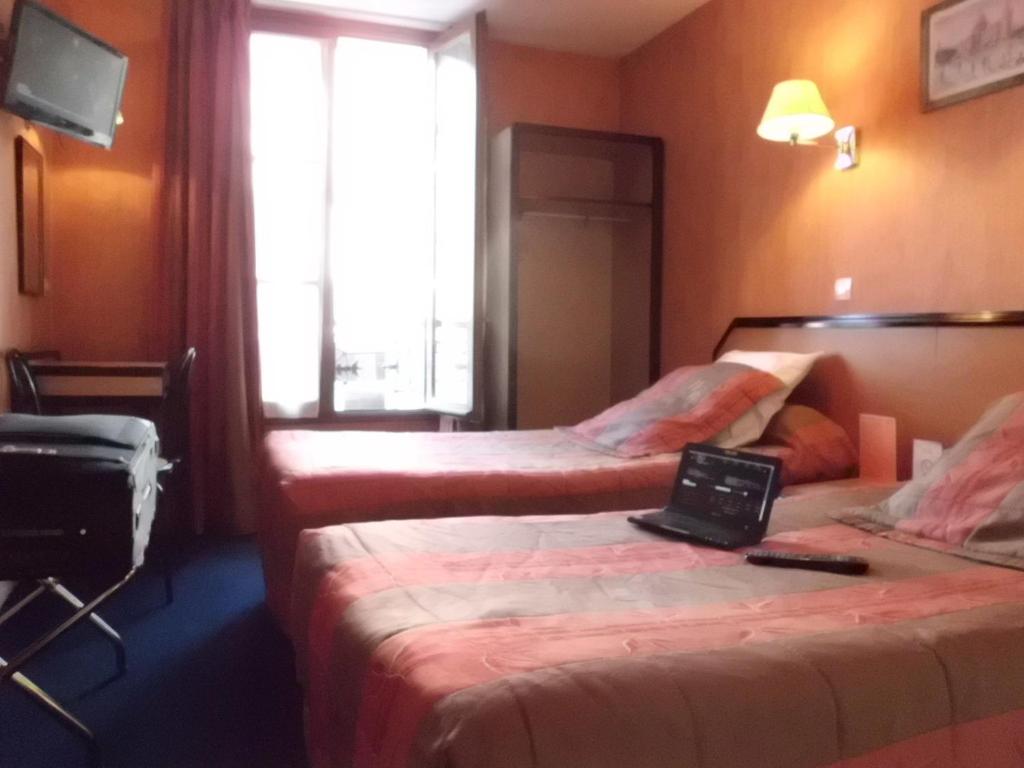 Двухместный (Двухместный номер с 2 отдельными кроватями) отеля Hôtel Beaunier, Париж