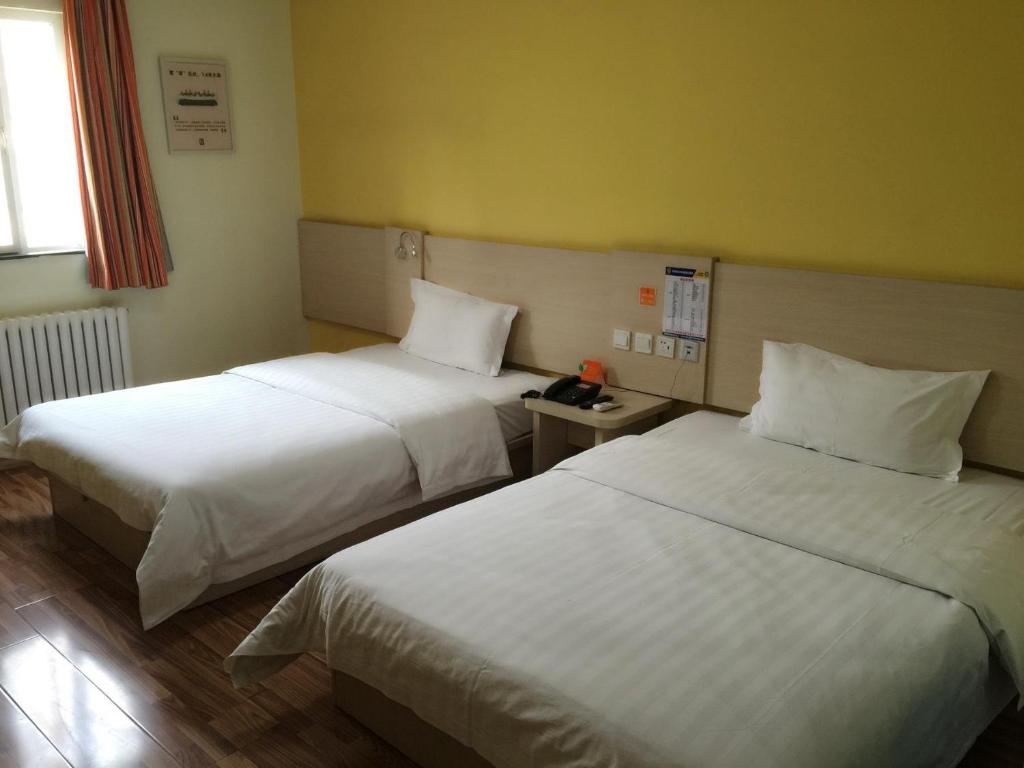 Двухместный (Двухместный номер бизнес-класса с 2 отдельными кроватями) отеля 7Days Inn Jinan Lixia District Government, Цзинань