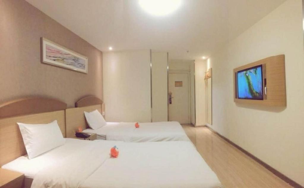 Двухместный (Двухместный номер бизнес-класса с 2 отдельными кроватями) отеля 7Days Inn Chongqing Shapingba, Чунцин