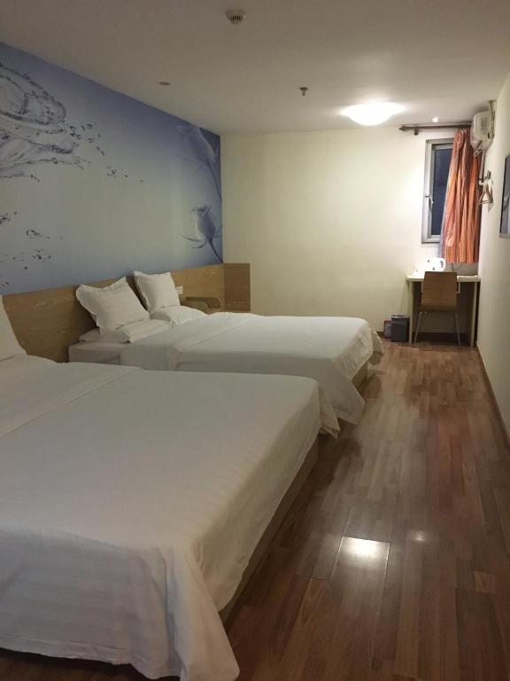 Двухместный (Двухместный номер бизнес-класса с 2 отдельными кроватями) отеля 7Days Inn Guangzhou Tianhe Tangxia Junjing Huayuan, Гуанчжоу
