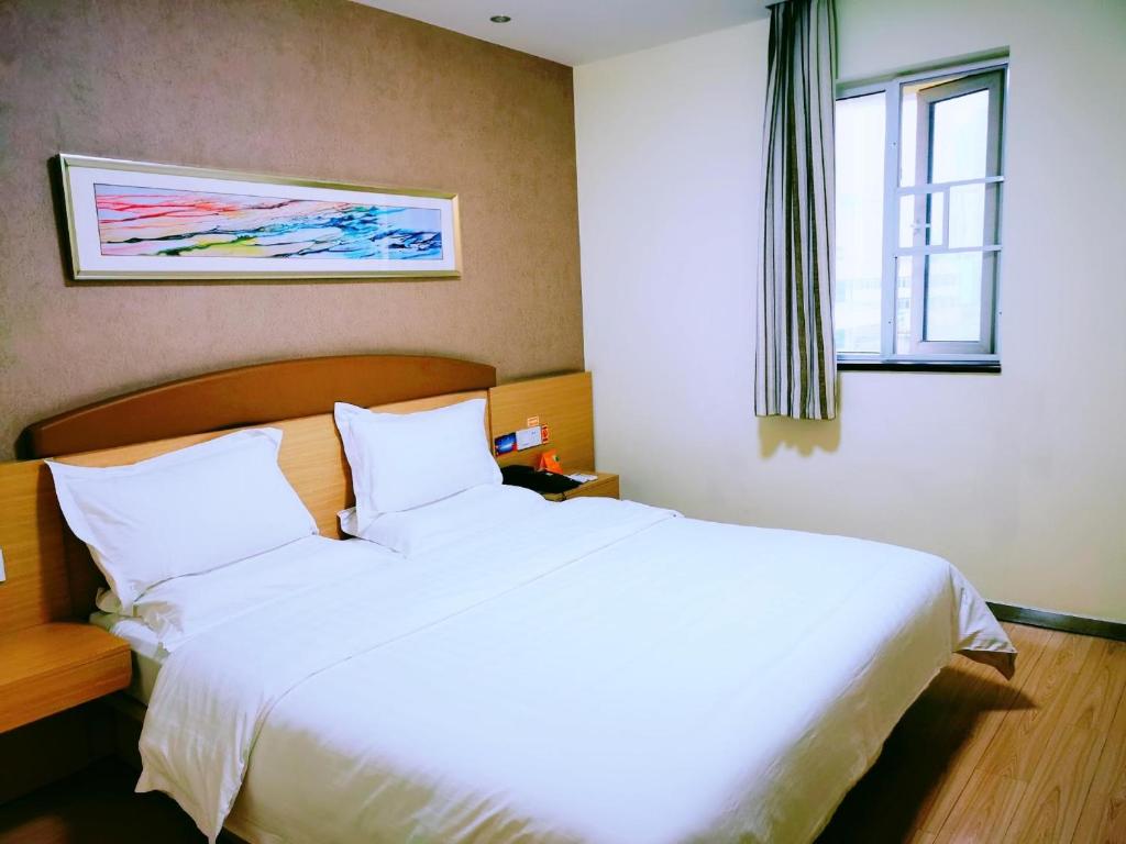 Двухместный (Улучшенный номер с кроватью размера «queen-size») отеля 7Days Inn Nanning Guangxi University, Наньнин