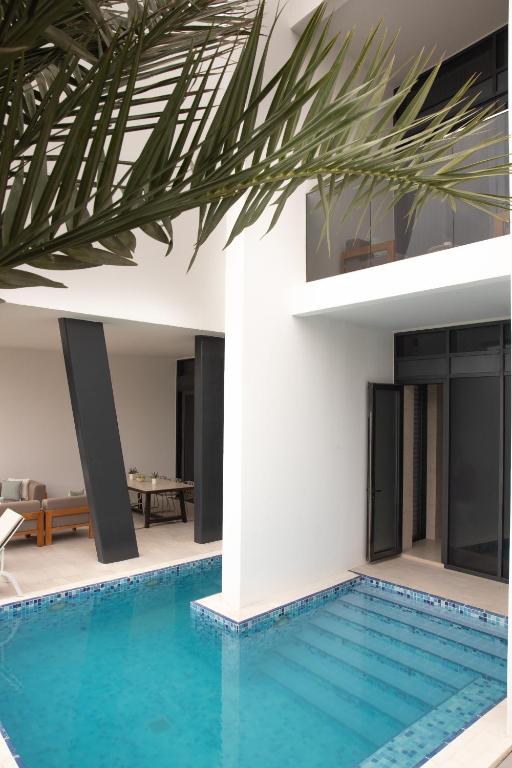Вилла (Двухуровневая вилла с 2 спальнями) курортного отеля Jumeirah at Saadiyat Island Resort, Абу-Даби