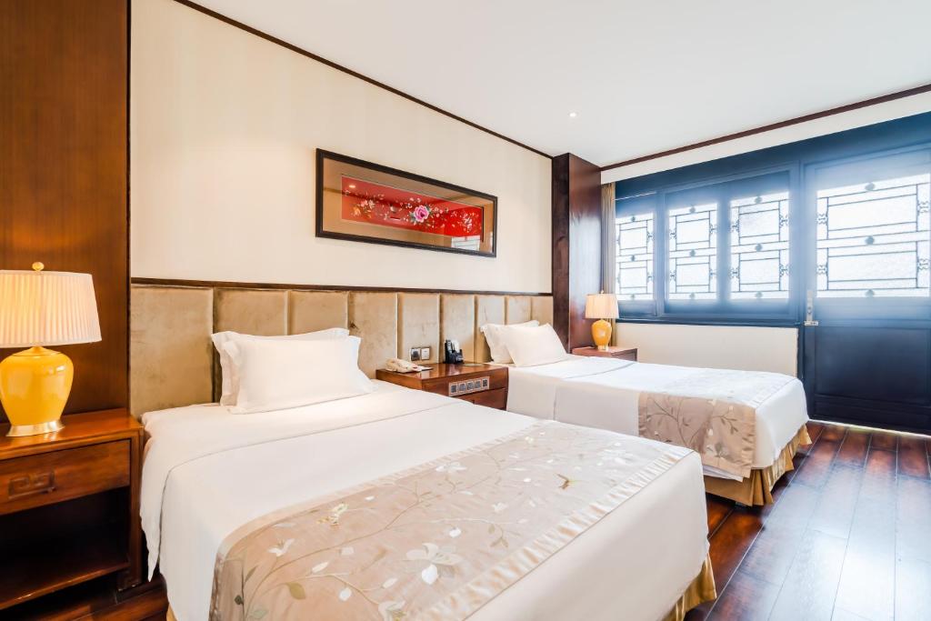 Двухместный (Двухместный номер Делюкс с 2 отдельными кроватями) отеля Buddha Zen Hotel, Чэнду