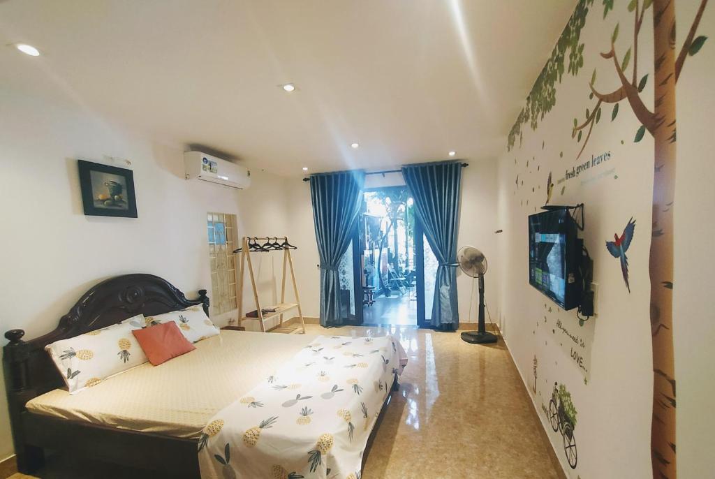 Двухместный (Двухместный номер Делюкс с 1 кроватью и душем) отеля Q' Garden Homestay Villa, Хюэ