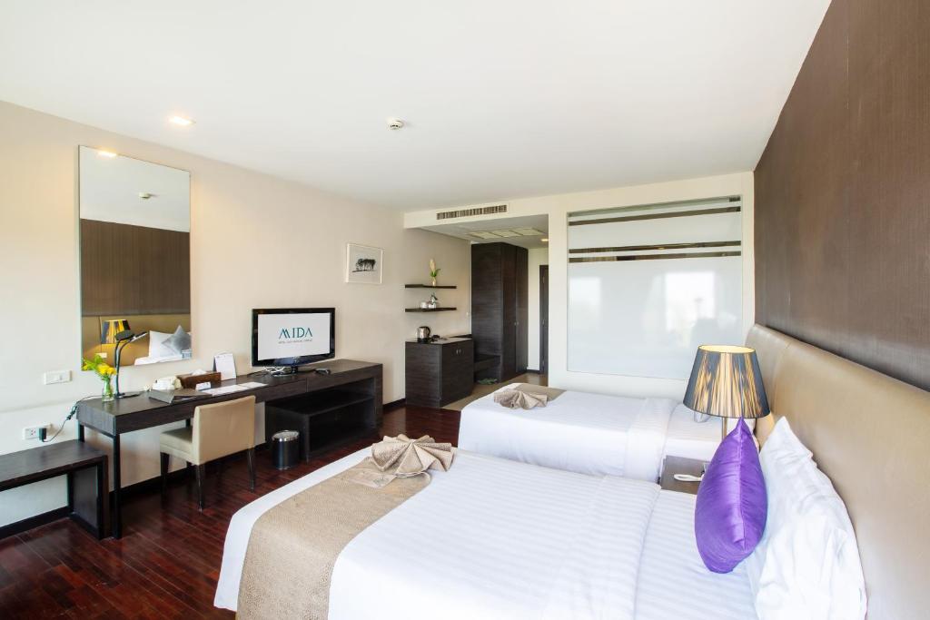 Двухместный (Улучшенный двухместный номер с 1 кроватью или 2 отдельными кроватями) отеля Mida Airport Hotel Bangkok (Donmueang), Бангкок