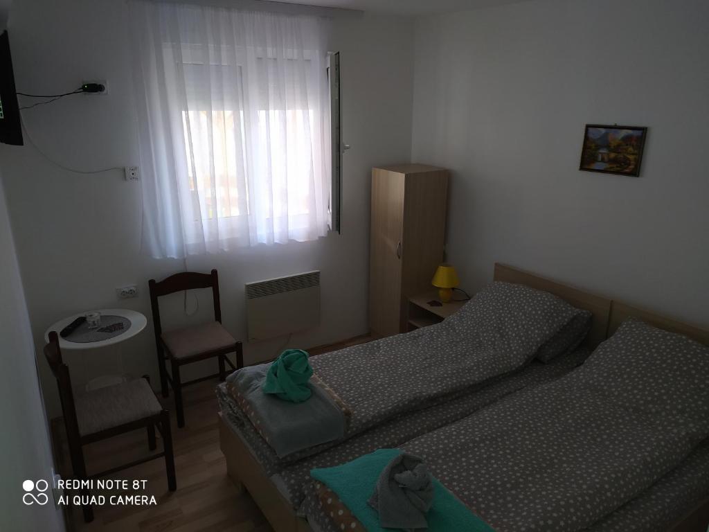 Двухместный (Двухместный номер с 1 кроватью или 2 отдельными кроватями и ванной комнатой) гостевого дома Guest House Vila Banjica, Пирот