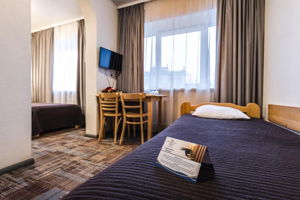 Четырехместный (Классический четырехместный номер с доступом в тренажерный зал) отеля Liva Hotel, Лиепая