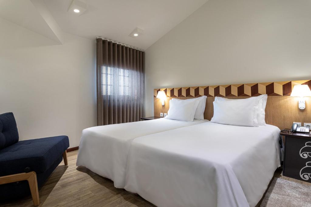 Двухместный (Двухместный номер с 2 отдельными кроватями) отеля Hotel Aveiro Center, Авейру
