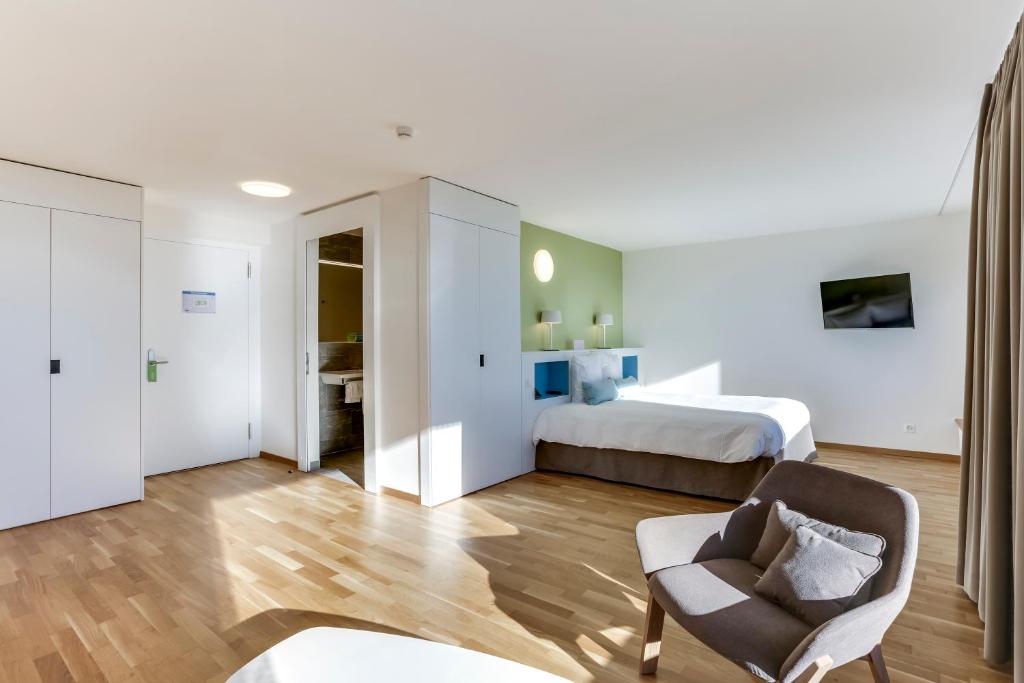Двухместный (Двухместный номер с кроватью размера «king-size») отеля Hôtel des Patients, Лозанна