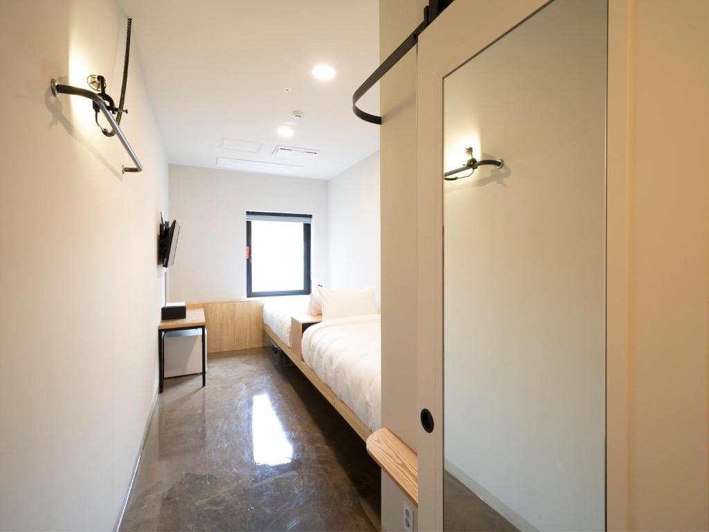 Двухместный (Стандартный двухместный номер с 2 отдельными кроватями), Wegoinn Hostel