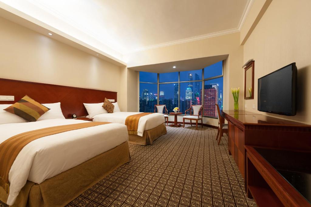 Двухместный (Двухместный номер бизнес-класса с 2 отдельными кроватями) отеля Ramada Pearl Hotel Guangzhou, Гуанчжоу