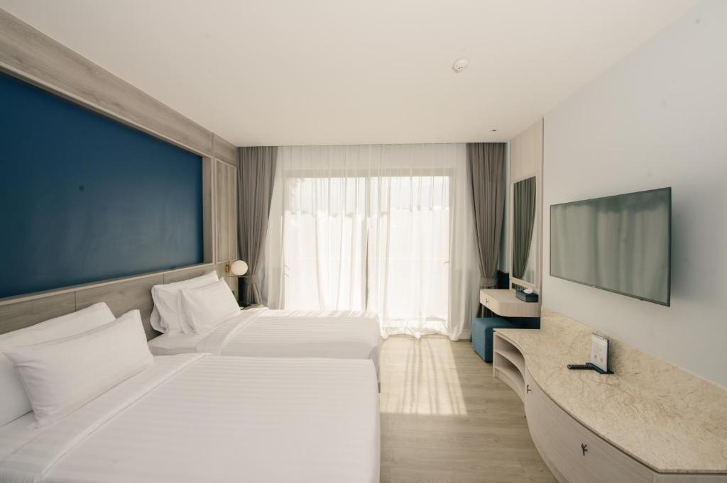 Двухместный (Улучшенный двухместный номер с 1 кроватью или 2 отдельными кроватями) отеля Seabed Grand Hotel Phuket, Пхукет