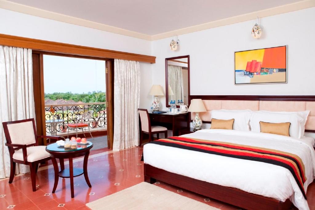 Двухместный (Улучшенный двухместный номер с 1 кроватью) курортного отеля Radisson Blu Resort, Goa, Кавелоссим
