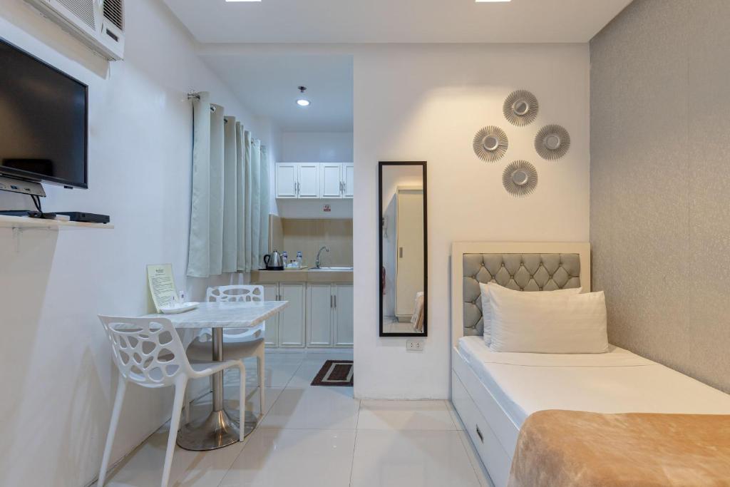Двухместный (Стандартный двухместный номер с 1 кроватью) отеля Baymont Suites & Residences, Манила