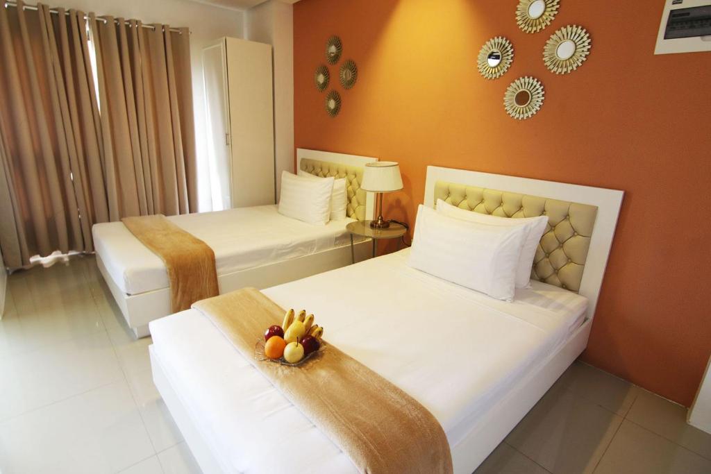 Двухместный (Двухместный номер Делюкс с 2 отдельными кроватями) отеля Baymont Suites & Residences, Манила
