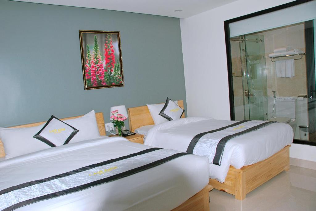 Трехместный (Трехместный номер Делюкс) отеля Lan Anh Hotel, Далат