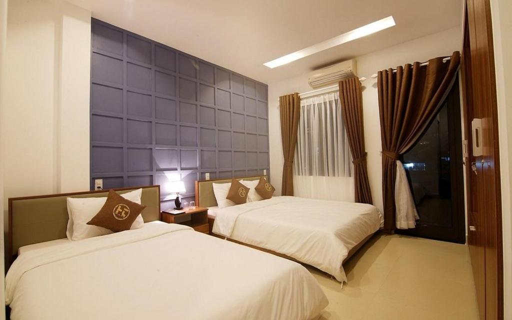 Двухместный (Двухместный номер Делюкс с 1 кроватью и балконом) отеля Poetic Hue Hotel, Хюэ