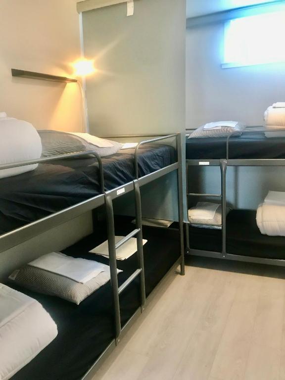 Номер (Спальное место на двухъярусной кровати в общем номере для мужчин и женщин) хостела Bergen Budget Hostel, Берген (Северное море)