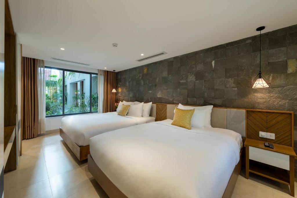 Апартаменты (Family Room with Balcony - Street and Pool View) отеля Ponte Boutique Villa, Дананг