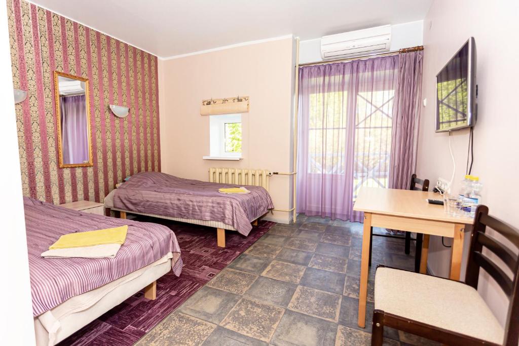 Двухместный (Двухместный номер с 2 отдельными кроватями и балконом) гостевого дома Guest House Rannaliiv, Вызу