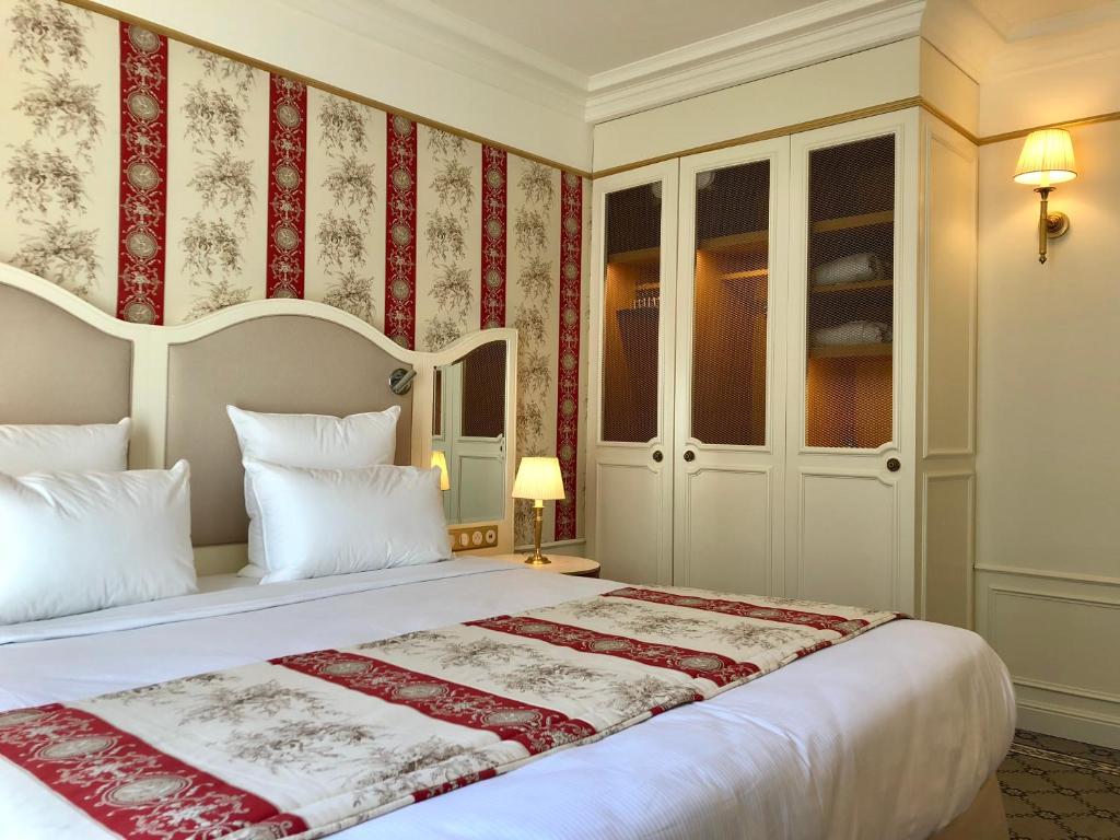 Двухместный (Улучшенный двухместный номер с 1 кроватью или 2 отдельными кроватями) отеля Hôtel Mayfair Paris, Париж