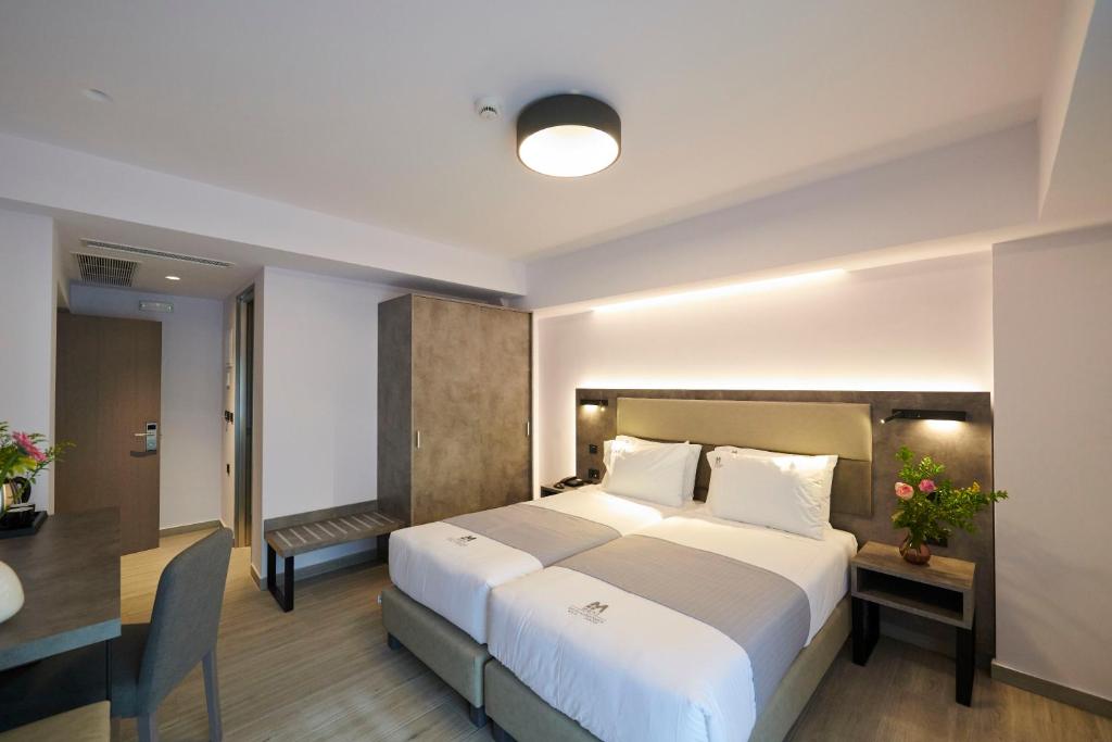 Двухместный (Улучшенный двухместный номер с 1 кроватью) отеля Meni Hotel, Афины