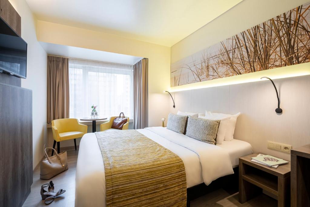 Двухместный (Улучшенный двухместный номер с 1 кроватью, вид на город) отеля Mercure Oostende, Остенде