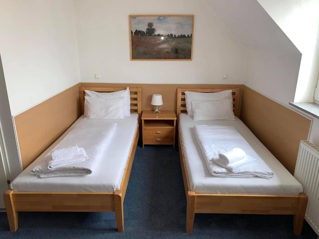 Двухместный (Стандартный двухместный номер с 2 отдельными кроватями) отеля Hotel Donaustadt Kagran, Вена