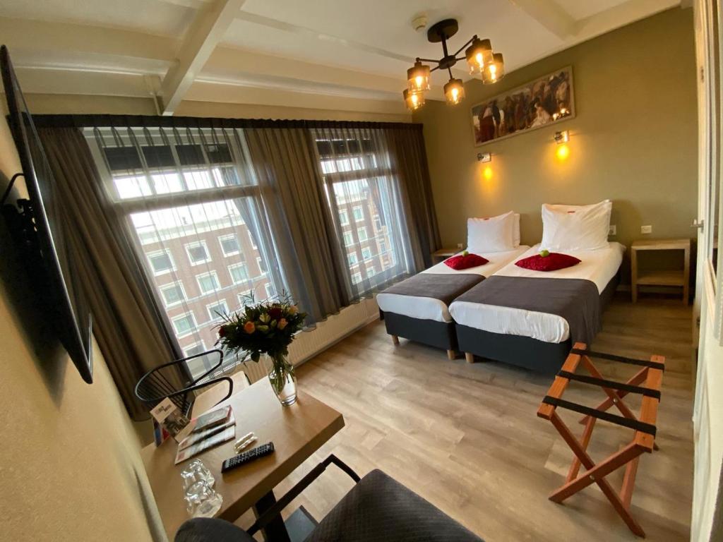 Двухместный (Двухместный номер с 2 отдельными кроватями) отеля Alp Hotel, Амстердам