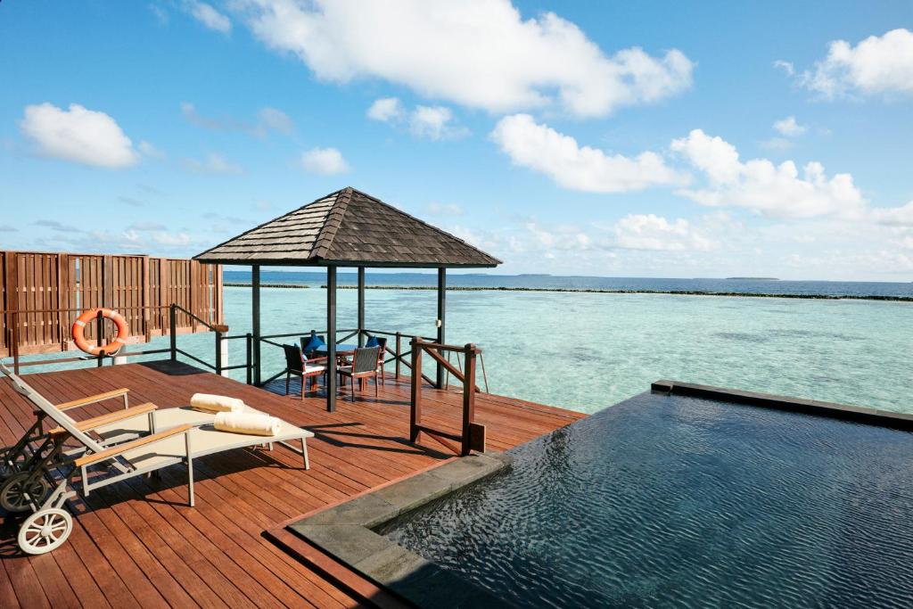 Вилла (Вилла у воды «Инфинити» с отдельной гостиной) курортного отеля The Sun Siyam Iru Fushi Luxury Resort Maldives, Медафуши