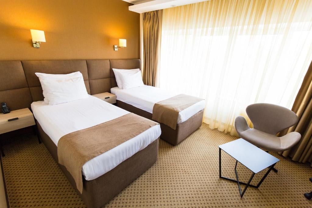 Двухместный (Стандартный двухместный номер с 2 отдельными кроватями) отеля Crystal Palace Hotel Бухарест