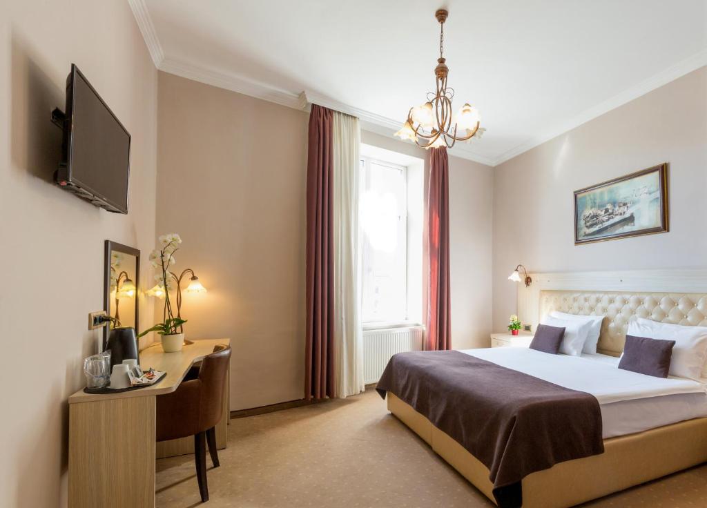 Двухместный (Улучшенный двухместный номер с 1 кроватью или 2 отдельными кроватями) отеля Belgrade City Hotel, Белград
