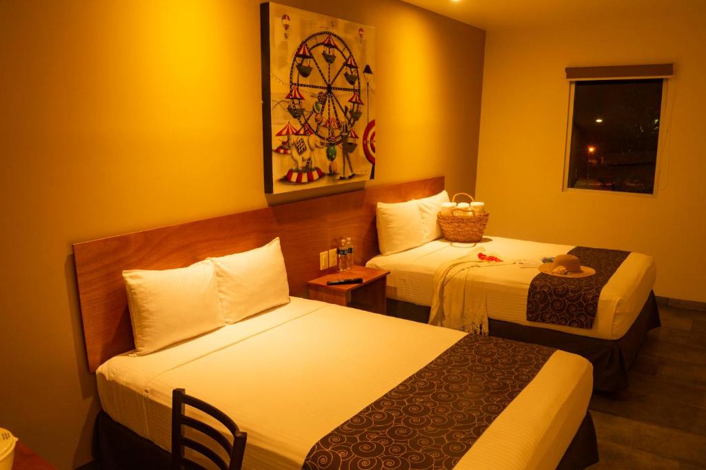 Двухместный (Двухместный номер с 2 отдельными кроватями) отеля AM Hotel y Plaza, Санта-Крус-Хуатулко