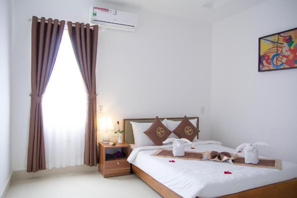 Двухместный (Классический двухместный номер с 1 кроватью или 2 отдельными кроватями) отеля Poetic Hue Hotel, Хюэ