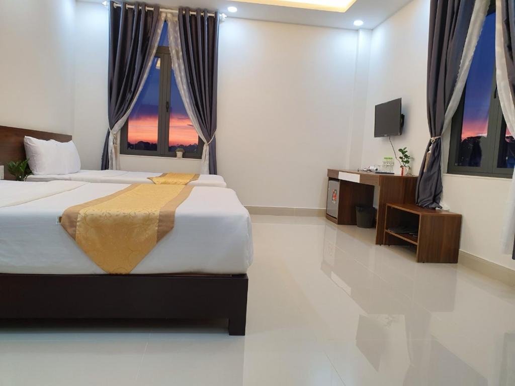 Четырехместный (Улучшенный четырехместный номер) отеля Đà Lạt Cao Nguyên Hotel, Далат