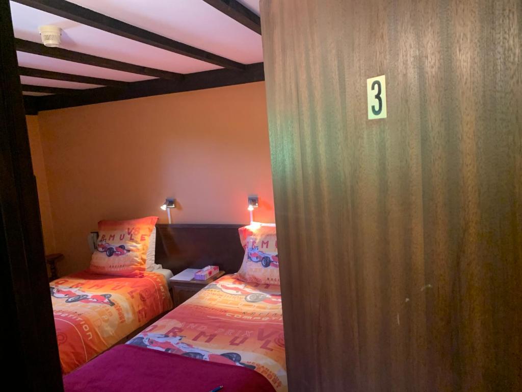 Двухместный (Двухместный номер с 2 отдельными кроватями) отеля Hotel Le Montana, Мальмеди