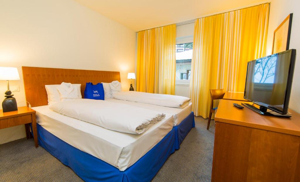 Двухместный (Улучшенный номер с 2 односпальными кроватями) отеля Le Bristol Leukerbad, Лойкербад