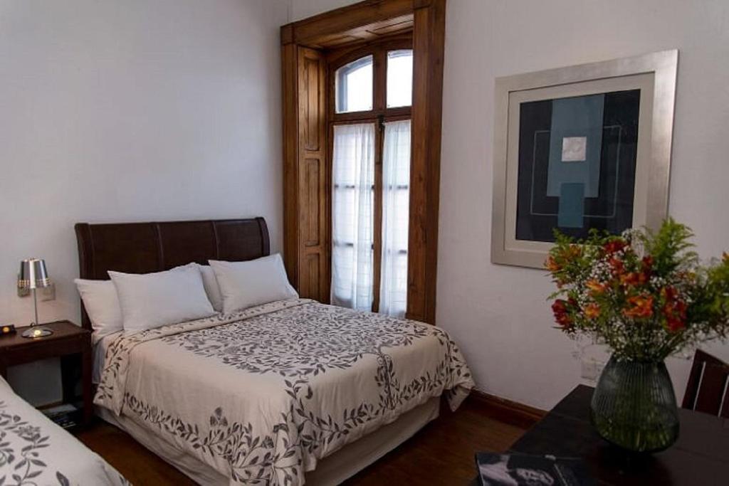 Двухместный (Двухместный номер с 2 двуспальными кроватями) отеля Antiguo Meson de Aspeytia, Керетаро