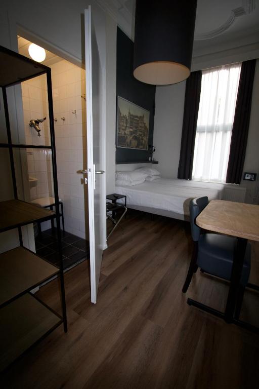 Двухместный (Двухместный номер с 2 отдельными кроватями и ванной комнатой) отеля Budget Hotel Hortus, Амстердам