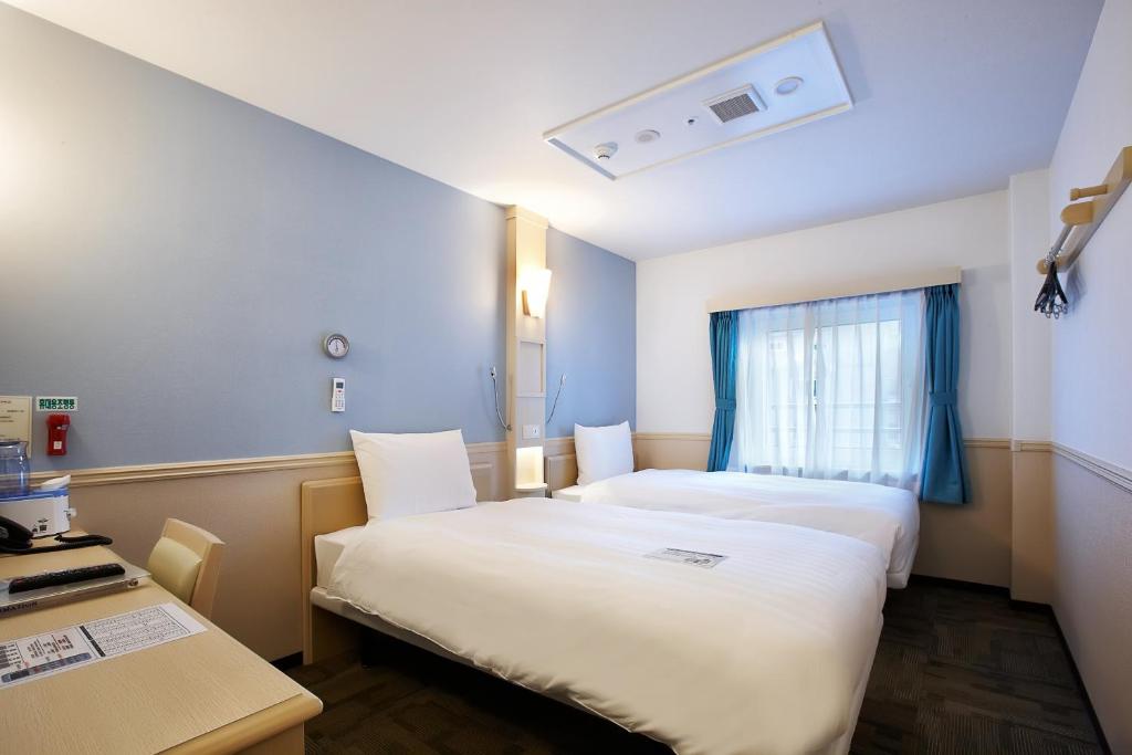 Двухместный (Стандартный двухместный номер с 2 отдельными кроватями) отеля Toyoko Inn Seoul Yeongdeungpo, Сеул