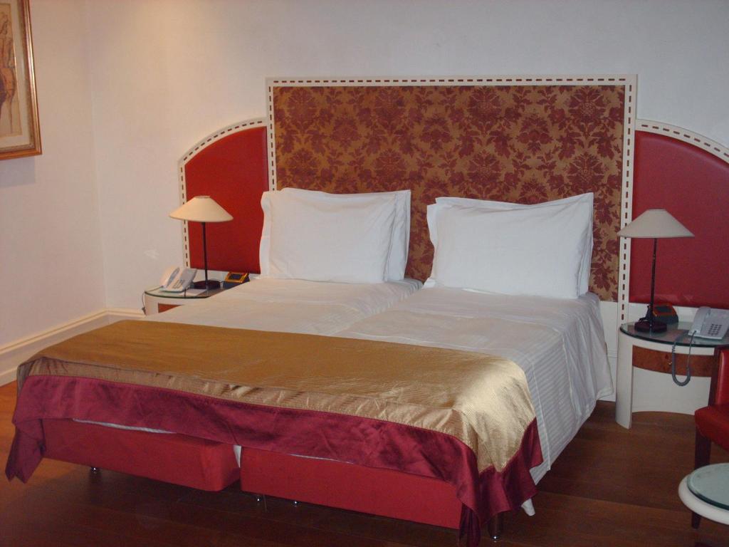 Двухместный (Улучшенный двухместный номер с 1 кроватью или 2 отдельными кроватями) отеля Hotel Bonvecchiati, Венеция