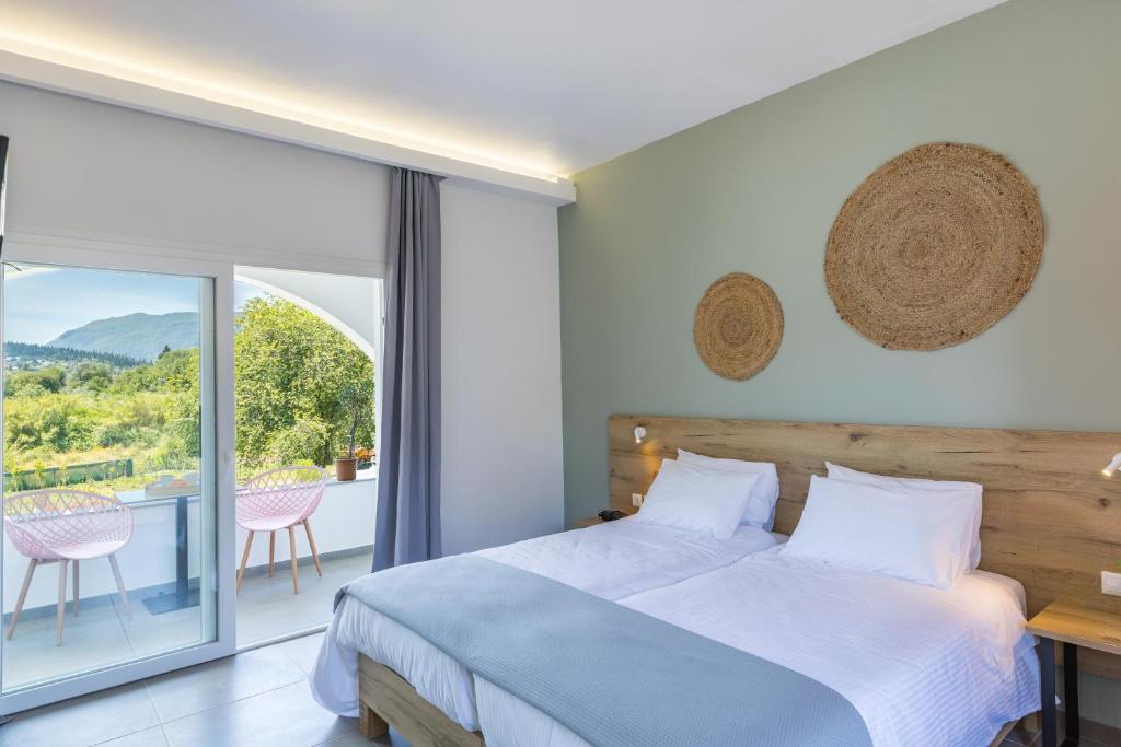 Двухместный (Двухместный номер Делюкс с 1 кроватью или 2 отдельными кроватями и видом на бассейн) отеля La Maison Corfu, Ипсос