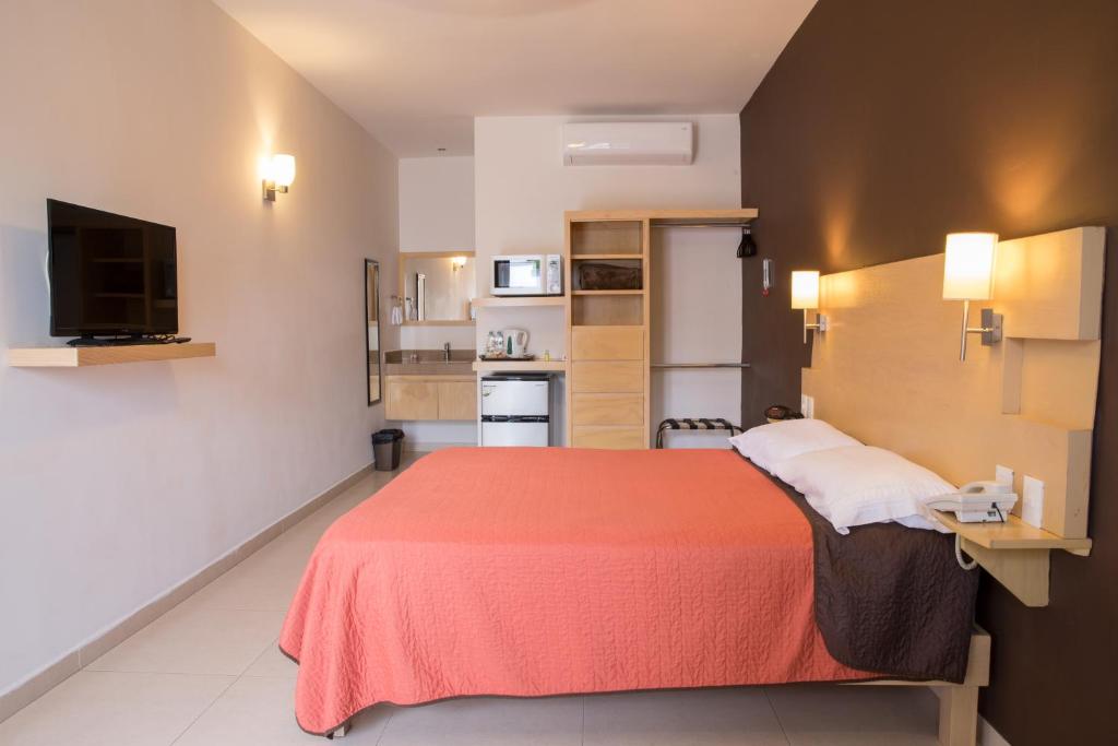 Двухместный (Улучшенный номер с кроватью размера «queen-size») отеля Nova Hotel, Кадерейта Хименес
