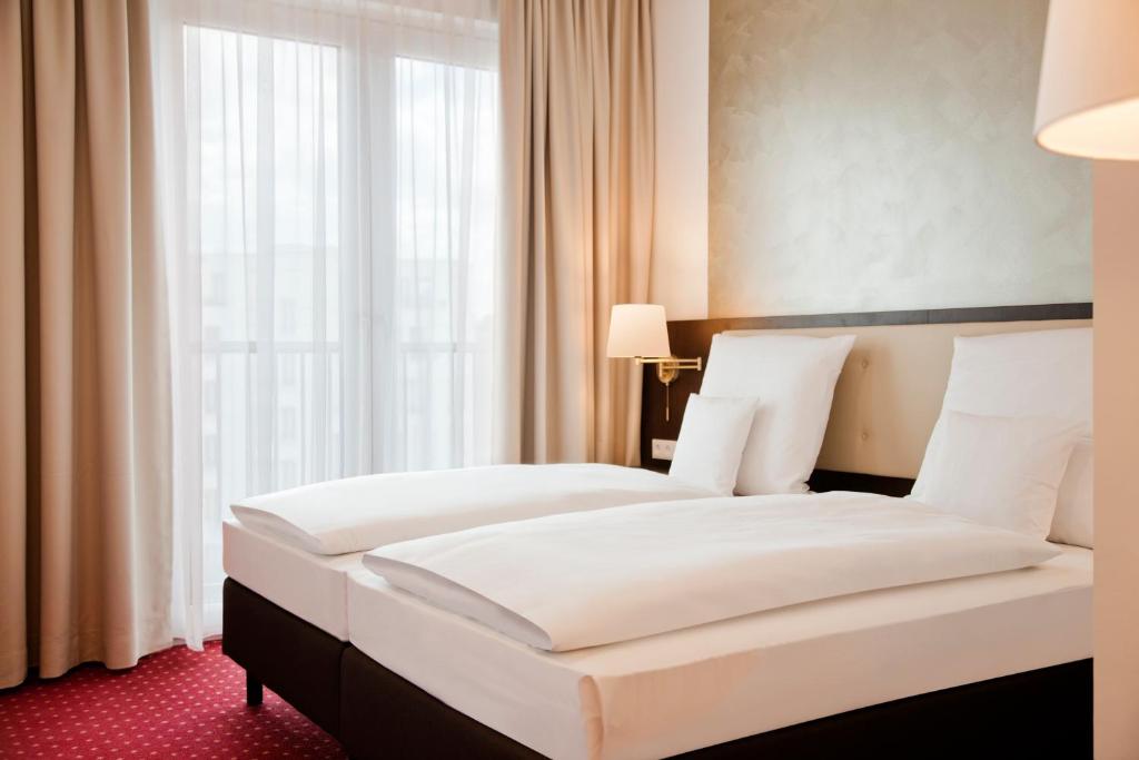 Двухместный (Двухместный номер «Комфорт» с 1 кроватью или 2 отдельными кроватями) отеля Gold Palais Hotel, Берлин