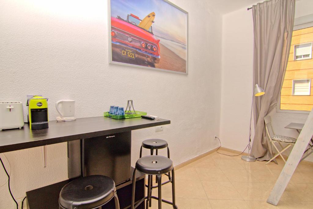 Трехместный (Трехместный номер с общей ванной комнатой) семейного отеля Low cost room Mercado Malaga, Малага