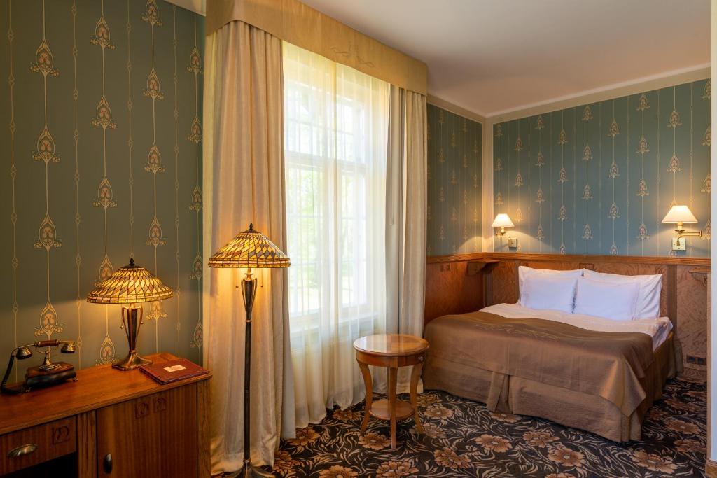 Двухместный (Двухместный номер Делюкс с 1 двуспальной или 2 отдельными кроватями) отеля Ekesparre Boutique Hotel, Курессааре